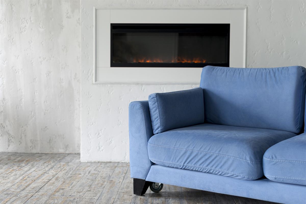 Front view room with couch and fireplace