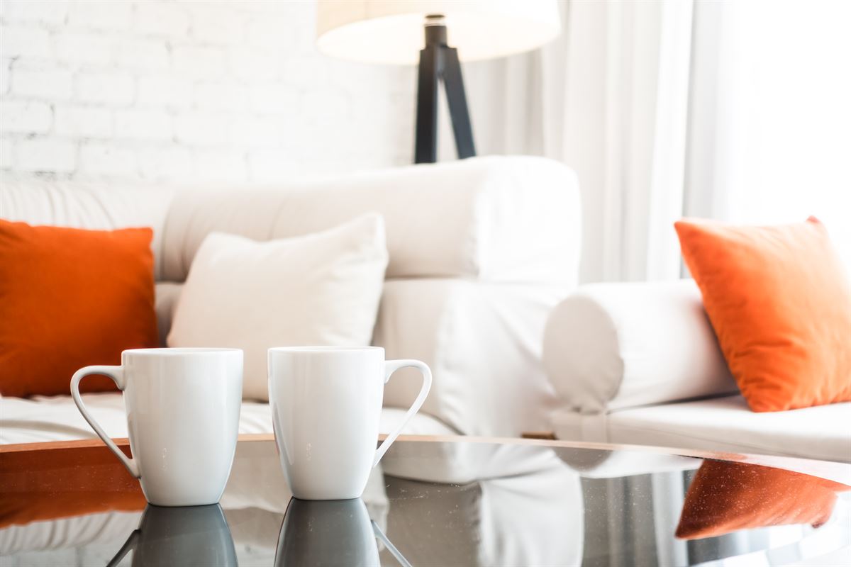 White coffee cup in cozy setting